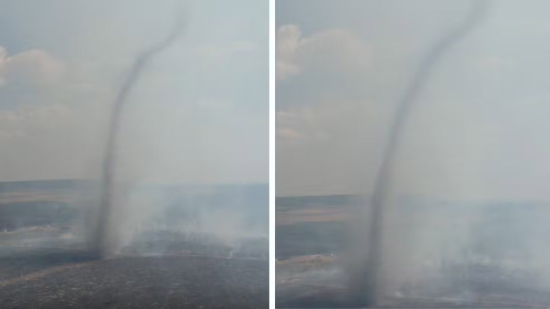 Redemoinho gigante se forma durante incêndio florestal e impressiona em Posse, Goiás